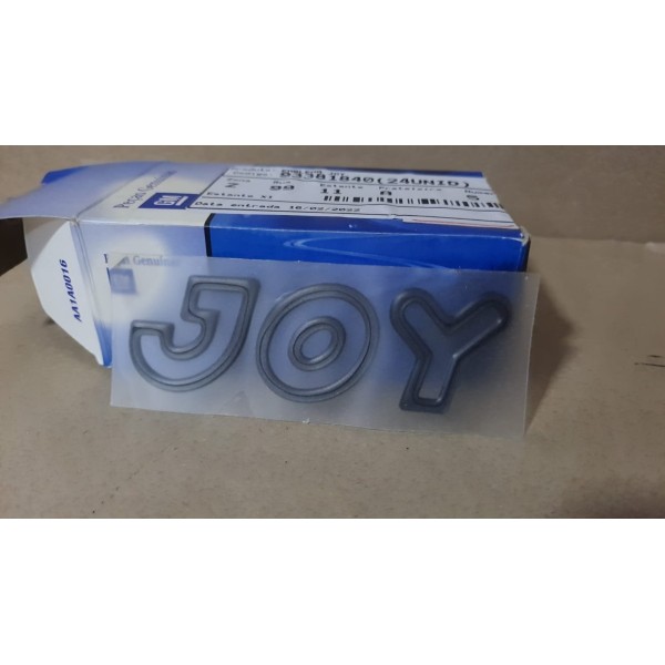 Emblema Joy Porta Dianteira Novo Corsa Meriva Original Cinza